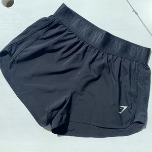 Worn once, black gym shark shorts.